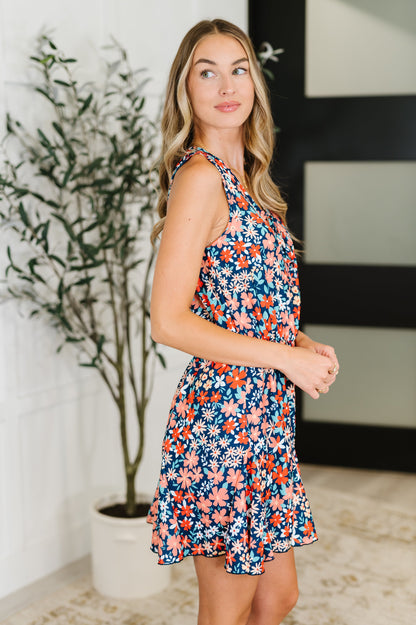 Meadow Mischief Sleeveless Romper in Navy/Orange/Teal