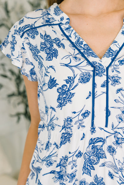 The Missing Piece Tiered Flutter Sleeve Dress
